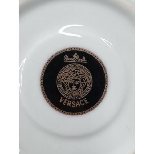 759 - Four pieces of Rosenthal porcelain from the Versace collection, includes two cups and two saucers.