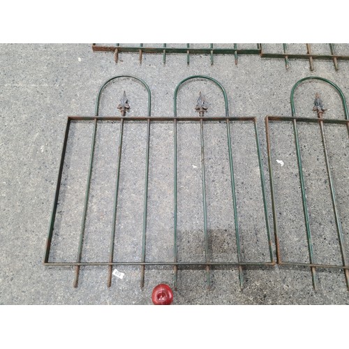 905 - Star Lot : A fabulous Set of antique iron garden fence panels featuring decorative fleur-de-lis fini... 