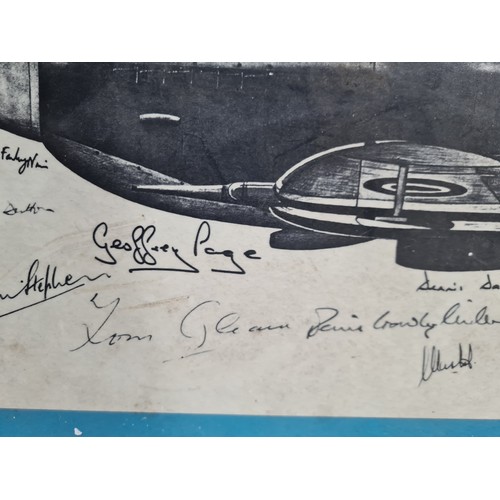 884 - Star Lot : An original print of a Spitfire aircraft, featuring multiple hand signed signatures of sp... 