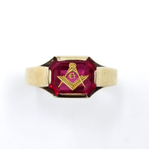 576 - Star Lot : A very attractive Masonic gem set ring set in 14 carat gold marked to band. Ring size - V... 