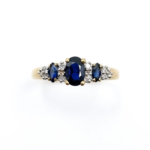 584 - Super Star Lot : A nice example of a diamond and sapphire stone ring set in nine carat gold. Ring si... 