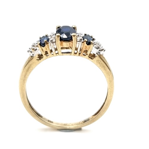 584 - Super Star Lot : A nice example of a diamond and sapphire stone ring set in nine carat gold. Ring si... 