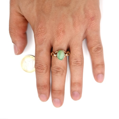 587 - Star Lot : A lovely heavy antique 9 carat gold green tourmaline stone ring with attractive twist mou... 