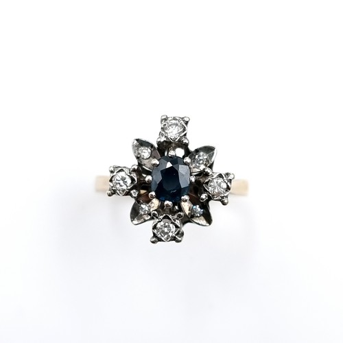 590 - Super Star Lot : A very pretty sapphire and diamond ring with a large central sapphire central stone... 