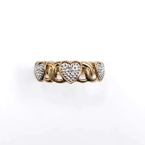 591 - Star Lot : A diamond heart shaped ring with diamond stamped to band set in nine carat gold. Ring siz... 