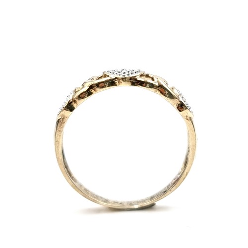 591 - Star Lot : A diamond heart shaped ring with diamond stamped to band set in nine carat gold. Ring siz... 