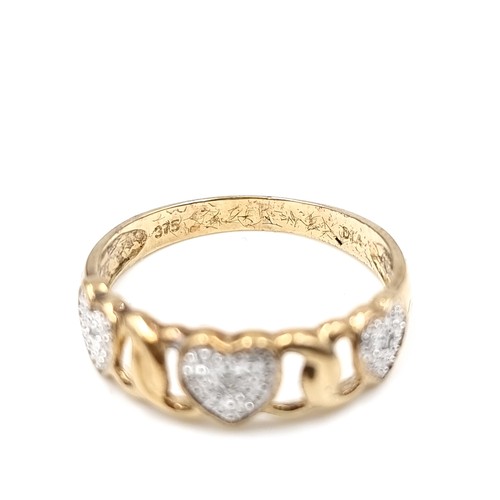 591 - Star Lot : A diamond heart shaped ring with diamond stamped to band set in nine carat gold. Ring siz... 