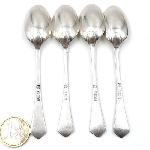 597 - Four vintage sterling silver teaspoons with bright cut handles hallmarked Sheffield. Weight - 41 gra... 