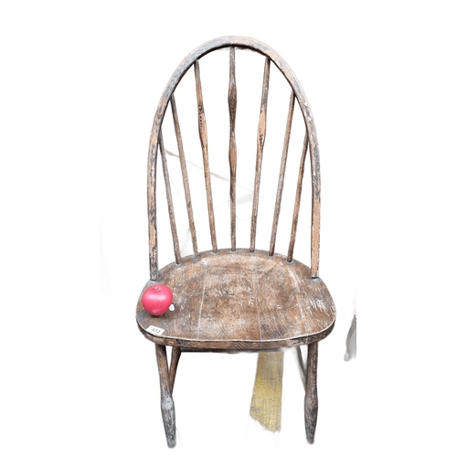 432 - Star Lot : Windsor chair in solid oak, from the late 18th early 19th century. Features a rounded top... 