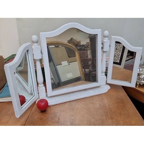 433 - Vintage tri-fold vanity mirror features white-painted wood with a central mirror flanked by two adju... 