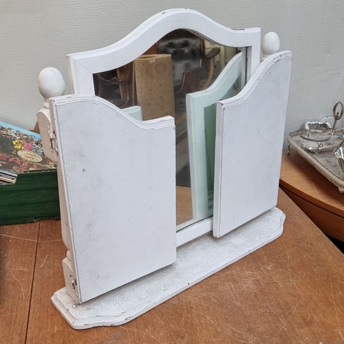 433 - Vintage tri-fold vanity mirror features white-painted wood with a central mirror flanked by two adju... 