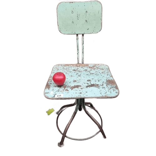 435 - Star Lot : A Vintage industrial metal swivel machinists chair with distressed green paint from the e... 