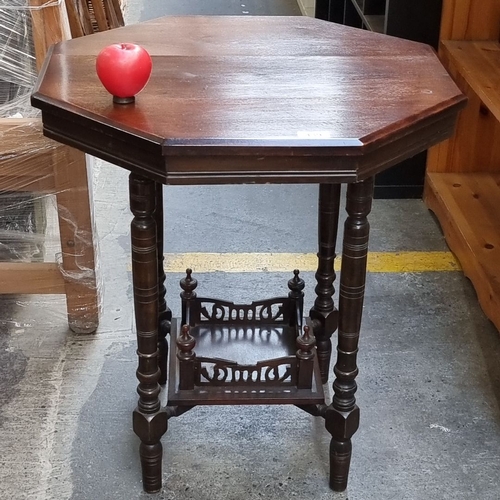 439 - Star Lot : A stunning Victorian octagonal mahogany side table with turned legs and lower fretwork sh... 