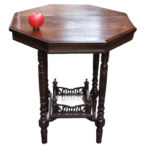 439 - Star Lot : A stunning Victorian octagonal mahogany side table with turned legs and lower fretwork sh... 