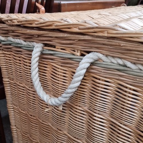 443 - A very Large woven wicker storage chest with leather buckle details by the Somerset Willow company.