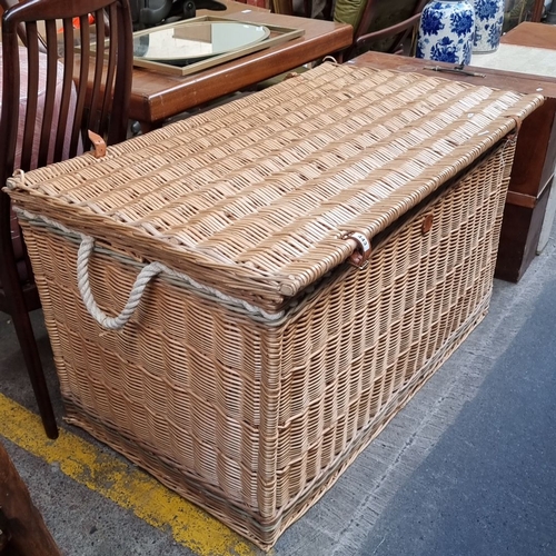 443 - A very Large woven wicker storage chest with leather buckle details by the Somerset Willow company.