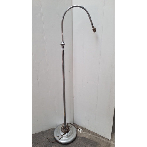 452 - Vintage metal floor lamp with chrome finish, adjustable gooseneck arm, and round weighted base. Incl... 