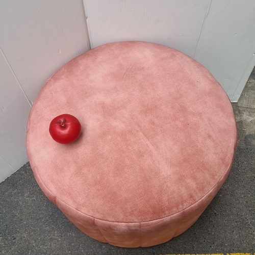 457 - Pink round ottoman with plush velvet upholstery. Nice decorative, functional piece of furniture.