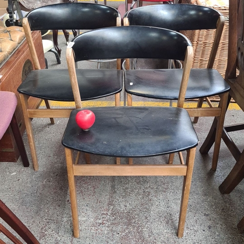 459 - Set of three great looking Mid-Century Modern  chairs with wooden frames and black seats. These have... 