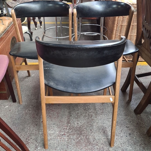 459 - Set of three great looking Mid-Century Modern  chairs with wooden frames and black seats. These have... 