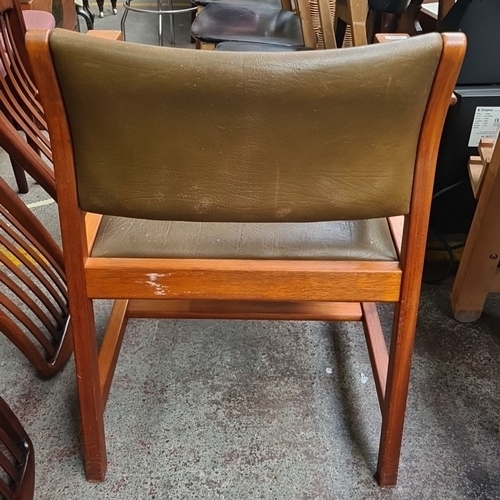 460 - A very handsome Mid-Century Modern armchair with oak frame and green leather upholstery.