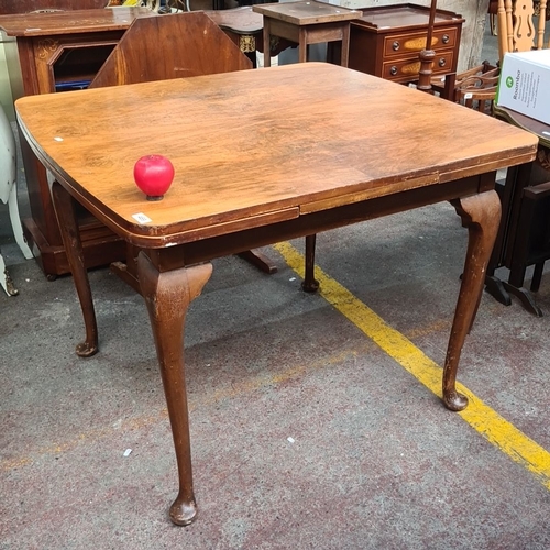 469 - Star lot : A very handsome Art Deco  golden mahogany extending dining table features cabriole legs a... 