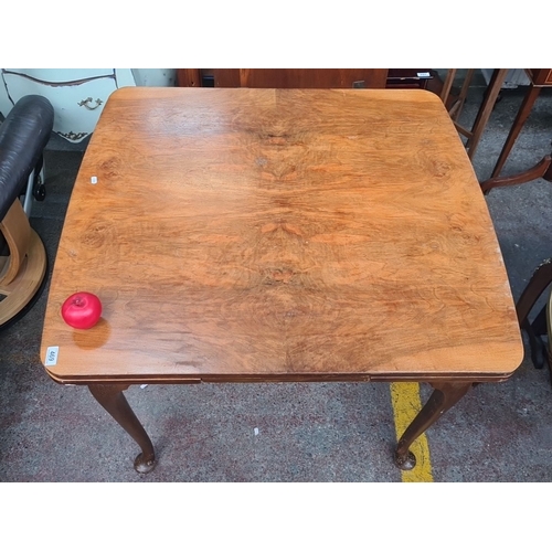 469 - Star lot : A very handsome Art Deco  golden mahogany extending dining table features cabriole legs a... 