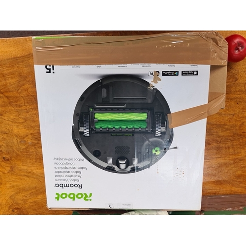 472 - iRobot Roomba i5 robotic vacuum, boxed. Features advanced cleaning system and intelligent navigation... 