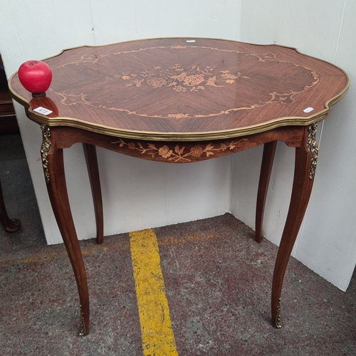 473 - Star Lot : A stunning Italian  inlaid mahogany occasional table with floral marquetry and ormolu mou... 