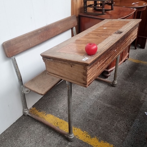 497 - Vintage school desk with attached bench, featuring a wooden writing surface and metal legs. Classic ... 