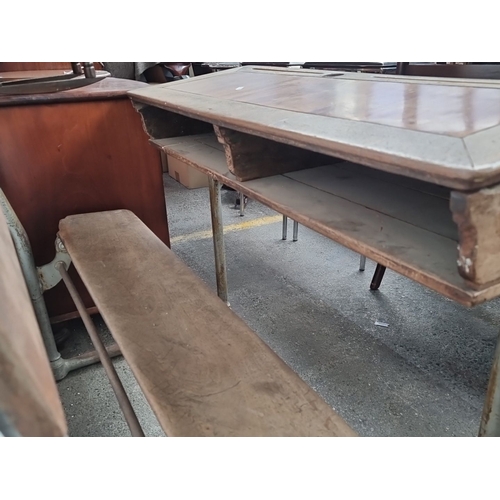 497 - Vintage school desk with attached bench, featuring a wooden writing surface and metal legs. Classic ... 