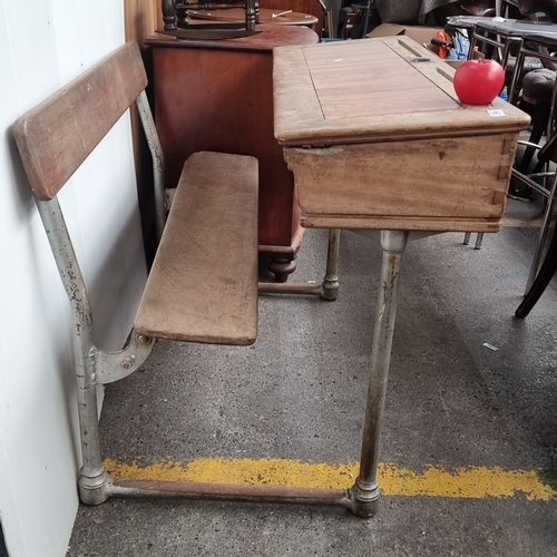 497 - Vintage school desk with attached bench, featuring a wooden writing surface and metal legs. Classic ... 