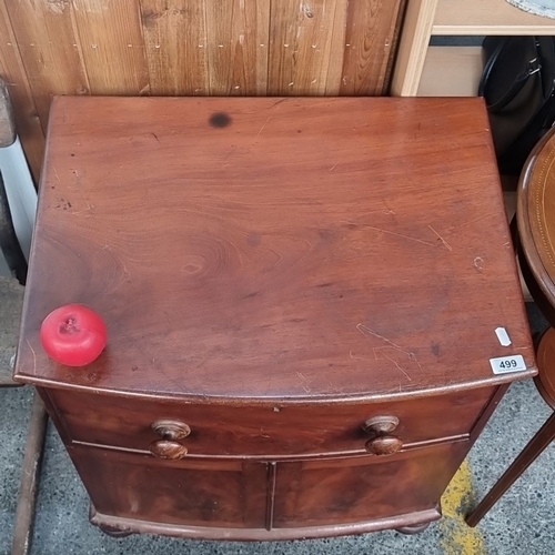 499 - 19th Century red Mahogany Bow Fronted Camode. The top lifts up. Could do a job in a pinch.