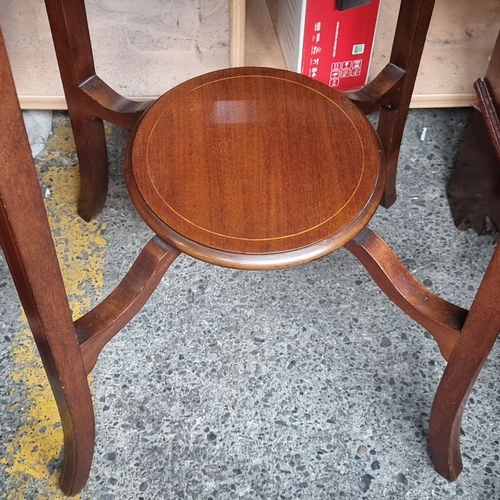 500 - Mahogany round  side table with round top and lower shelf, featuring delicately inlaid detailing.