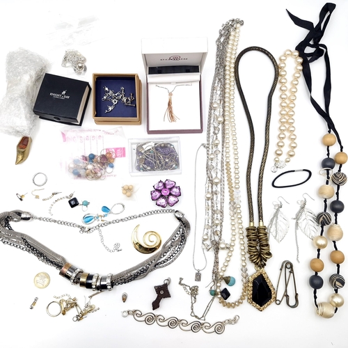 15 - A large assorted collection of costume jewellery containing some boxed items together with necklaces... 