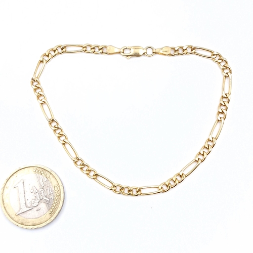 43 - Star lot : A Figaro link nine carat gold bracelet stamped Italy (375) with lobster clasp. Weight - 2... 