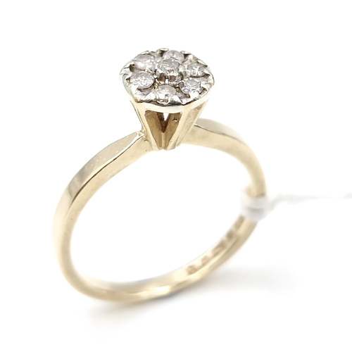 8 - Star lot : A nice example of a diamond flower cluster ring set in nine carat gold. Est. weight of di... 