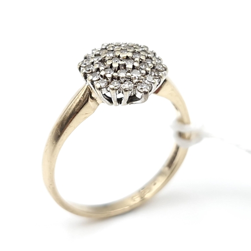 9 - Star lot : A most attractive nine carat gold diamond cluster ring. Est. weight of diamonds is 0.35 c... 