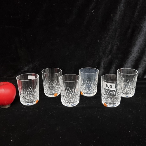 100 - A set of six Waterford Crystal tumbler glasses in the Lismore pattern. All in good condition with ac... 