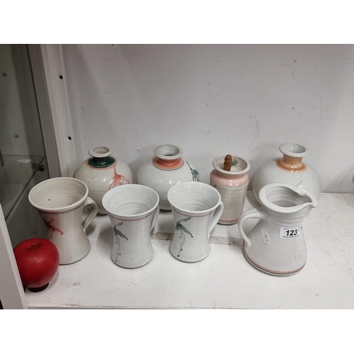 123 - A lot of eight Louis Mulcahy hand thrown art studio Irish pottery pieces including three tall mugs, ... 