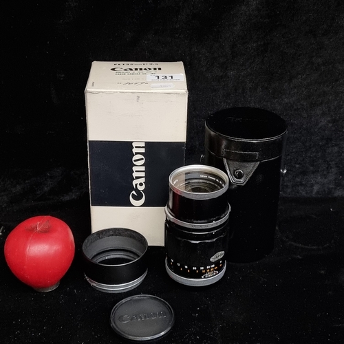 131 - New old stock  Canon FL Telephoto lens 135mm 1:2.5 with case and original packaging included.   It's... 