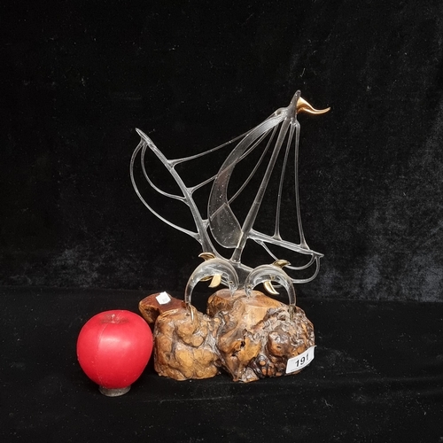 191 - A striking glass sculpture of two dolphins and a sail boat mounted on a bog oak plinth base. Unusual... 