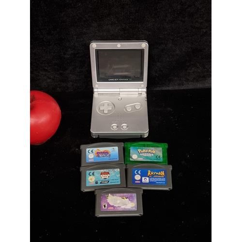 201 - A Nintendo GameBoy Advance with six games including Pokemon Emerald, Shrek, The Simpsons Road Rage, ... 