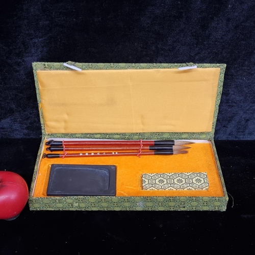 237 - A beautiful Chinese writing / calligraphy set comprising of writing brush, ink stick, ink slab. In a... 