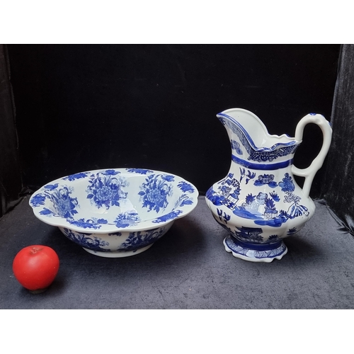 261 - A beautiful Victoriaware Ironstone blue and white wash basin with pitcher.