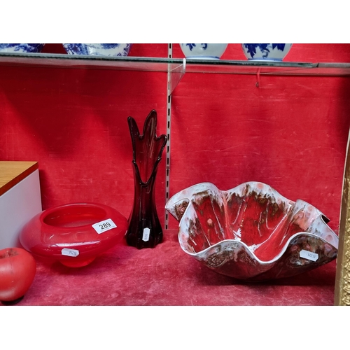 289 - Three fabulous pieces of studio art glass and pottery. All in complementary red tones. Inc a very la... 