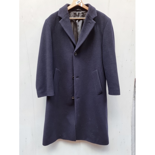 294 - Star Lot : A designer Hugo Boss designer 100% pure new wool navy coat. Size men's medium, women's la... 