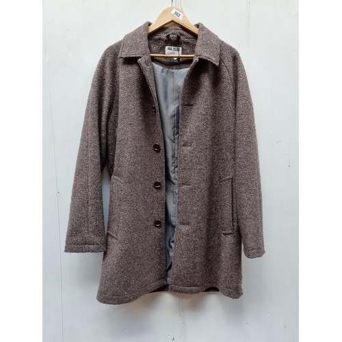 302 - An as new Paul Galvin wool mix herringbone tweed coat. 3/4 length with classic raglan sleeves. Size ... 