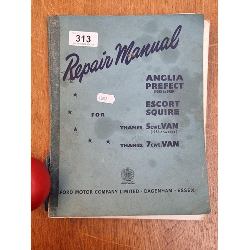 313 - A vintage Ford car and van repair manual. 'To assist in the efficient repair and maintenance of Angl... 