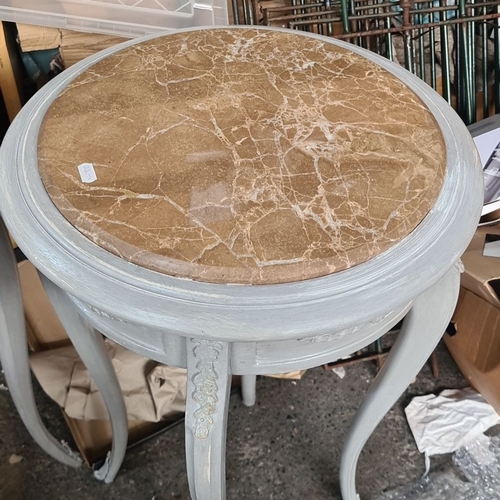 885 - Star Lot : A lovely Pair of French-style  tables have beige marble tops and curved cabriole legs. Th... 